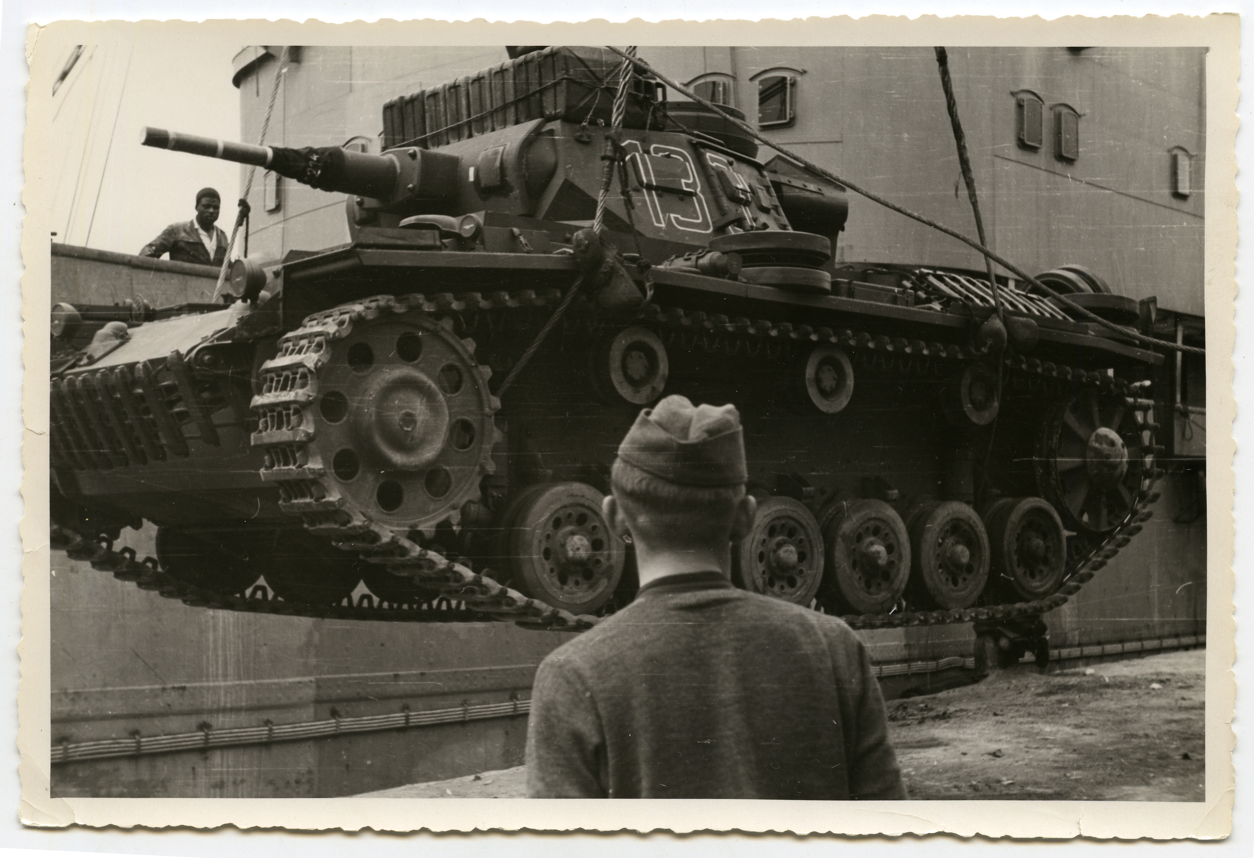 Pz.Kpfw. III Ausf.G 5cm (Fgst.Nr.65214) DAK Pz.Rgt.5 #133 {001}{a} Unloading from a ship in Tripoli, Libya, March 1941.jpg